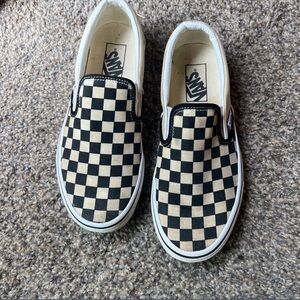 Checkered vans.
